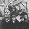 Lev Kopelev (holding a newspaper) with a student brigade, 1940s image